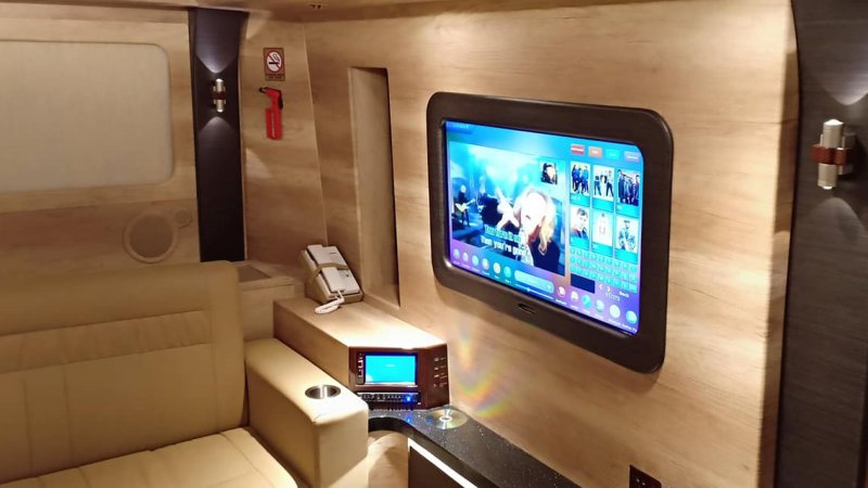 saturental – sewa bus pariwisata luxury trac astra interior 11 seats d